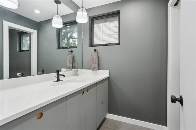 1712 Upperline St, New Orleans, LA 70115 - bathroom featuring baseboards, vanity, and tile patterned floors