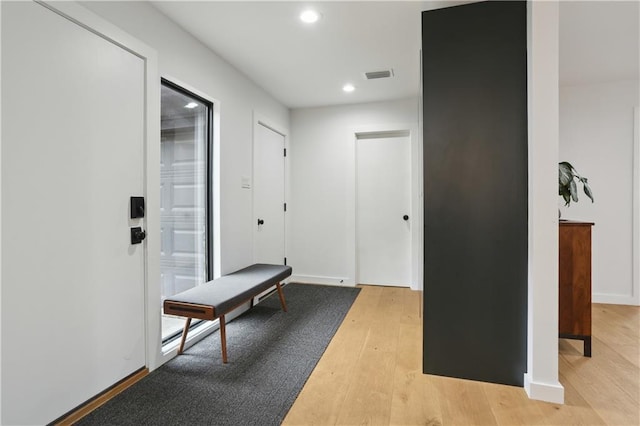 1712 Upperline St, New Orleans, LA 70115 - entrance foyer with light wood finished floors, recessed lighting, and baseboards