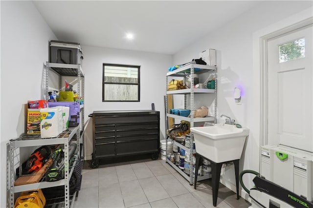 1712 Upperline St, New Orleans, LA 70115 - washroom with light tile patterned floors