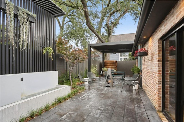 1712 Upperline St, New Orleans, LA 70115 - view of patio / terrace featuring a fenced backyard