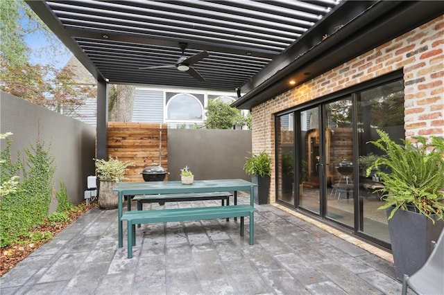 1712 Upperline St, New Orleans, LA 70115 - view of patio with fence, outdoor dining area, and a ceiling fan
