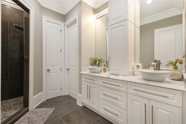 159 Elaine Ave, Harahan, LA 70123 - bathroom featuring crown molding, a walk in shower, double vanity, recessed lighting, and tile patterned flooring