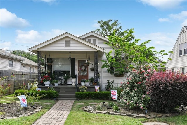 510 Nursery Ave, Metairie, LA 70005 - view of front of house with covered porch and fence
