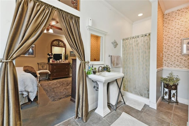 510 Nursery Ave, Metairie, LA 70005 - full bath featuring ornamental molding, a shower with curtain, wallpapered walls, wainscoting, and baseboards