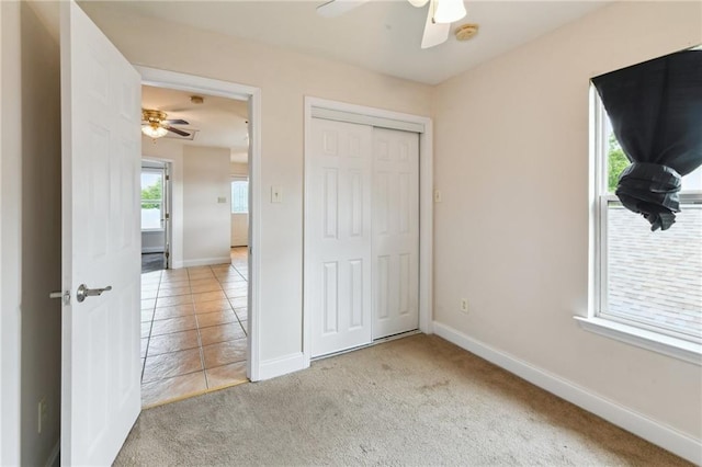 510 Nursery Ave, Metairie, LA 70005 - unfurnished bedroom with baseboards, carpet, a closet, and a ceiling fan