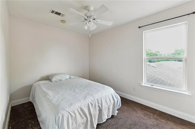 510 Nursery Ave, Metairie, LA 70005 - carpeted bedroom with baseboards and a ceiling fan