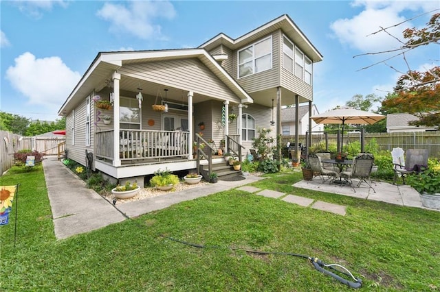 510 Nursery Ave, Metairie, LA 70005 - rear view of house featuring a porch