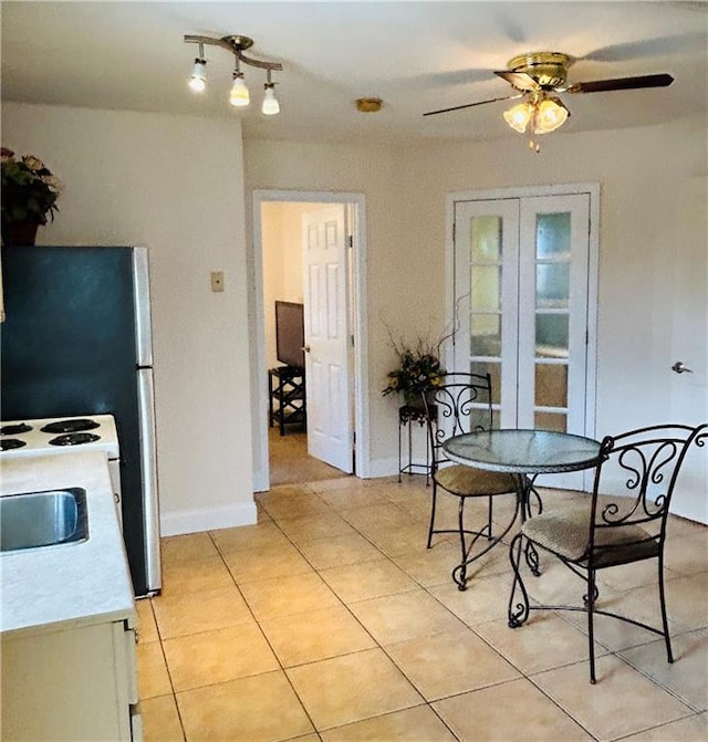 510 Nursery Ave, Metairie, LA 70005 - dining space featuring light tile patterned flooring and ceiling fan