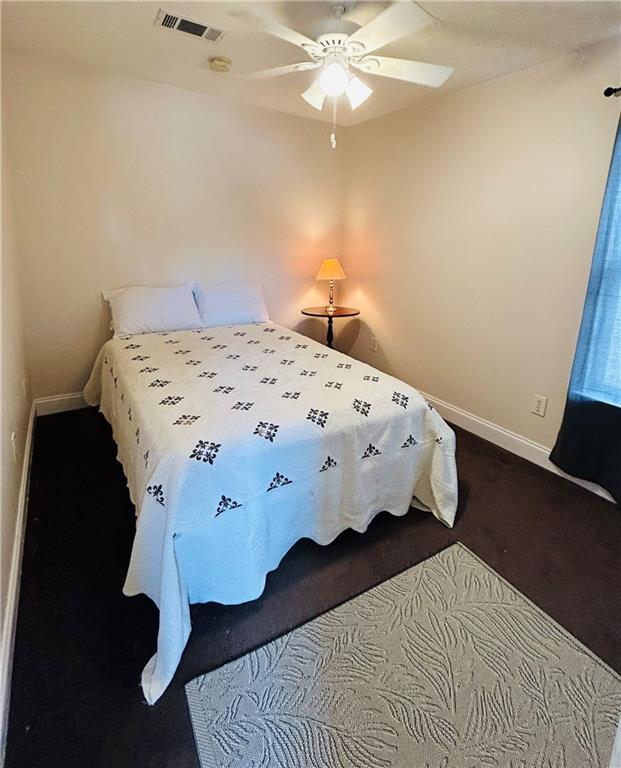 510 Nursery Ave, Metairie, LA 70005 - bedroom with carpet flooring and ceiling fan