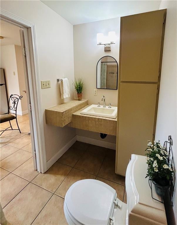 510 Nursery Ave, Metairie, LA 70005 - half bath with tile patterned flooring and a sink