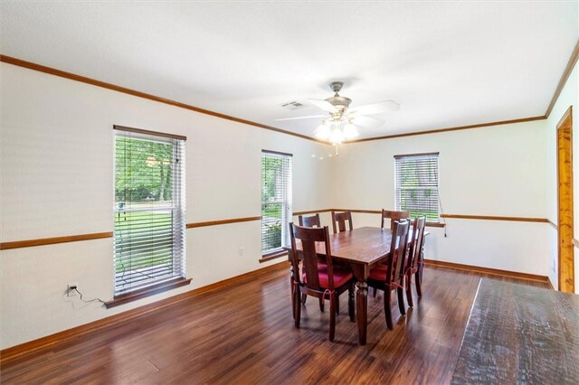 17 S Division Dr, Covington, LA 70433 - dining room with plenty of natural light, wood finished floors, crown molding, baseboards, and ceiling fan
