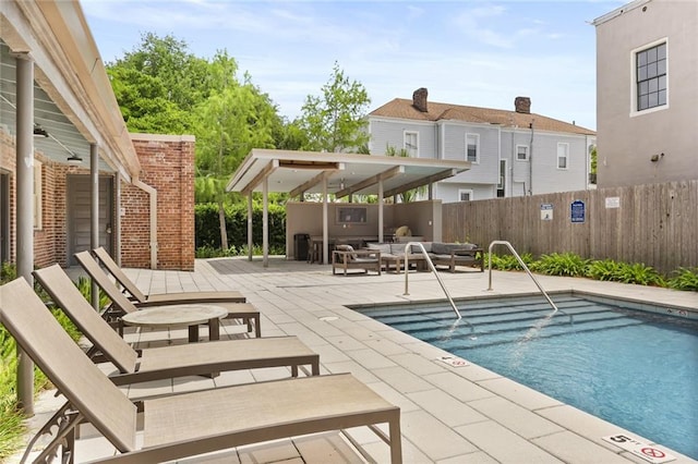 1215 Louisiana Ave Unit 105, New Orleans, LA 70115 - community pool with a patio and fence