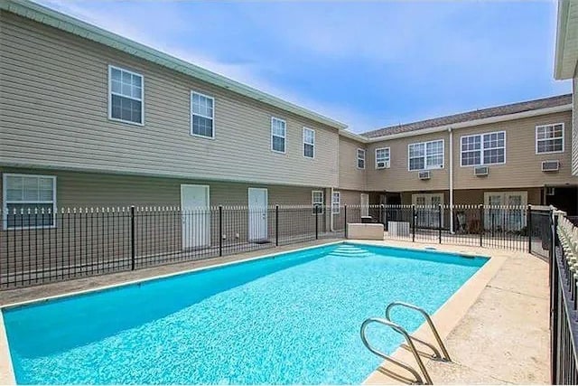 4854 Pontchartrain Dr Unit 3, Slidell, LA 70458 - view of swimming pool with fence