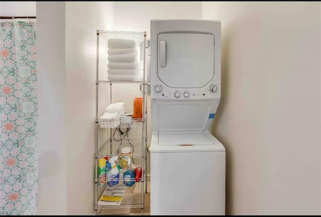 1614 Governor Nicholls St Unit 1, New Orleans, LA 70116 - laundry area featuring stacked washing machine and dryer