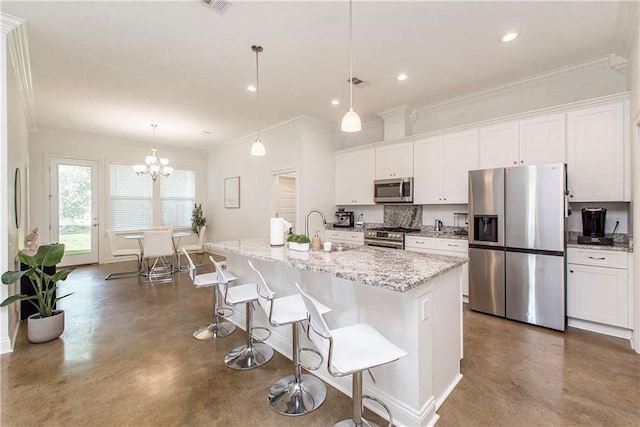 15326 S Tiger Loop, Ponchatoula, LA 70454 - kitchen featuring appliances with stainless steel finishes, finished concrete floors, a sink, white cabinets, and recessed lighting