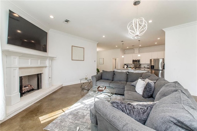 15326 S Tiger Loop, Ponchatoula, LA 70454 - carpeted living area featuring a chandelier, crown molding, baseboards, recessed lighting, and a fireplace