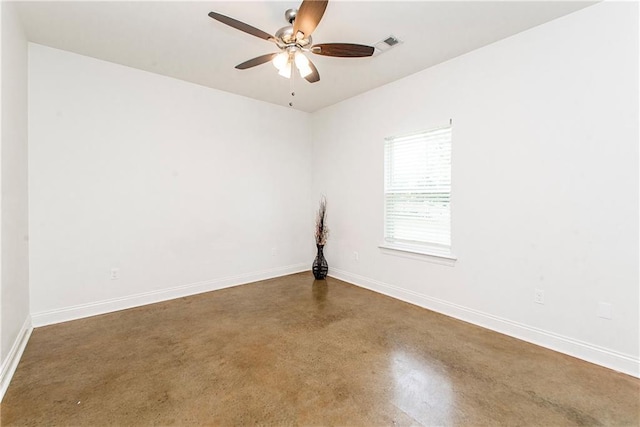 15326 S Tiger Loop, Ponchatoula, LA 70454 - unfurnished room with ceiling fan, finished concrete flooring, and baseboards
