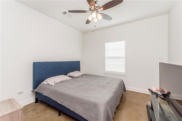 15326 S Tiger Loop, Ponchatoula, LA 70454 - carpeted bedroom with baseboards and a ceiling fan