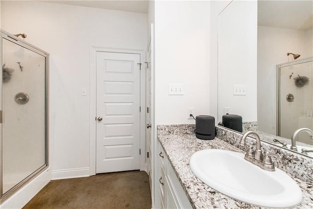 15326 S Tiger Loop, Ponchatoula, LA 70454 - full bathroom featuring a shower stall, vanity, and baseboards