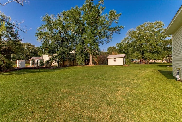 15326 S Tiger Loop, Ponchatoula, LA 70454 - view of yard featuring a shed and an outbuilding