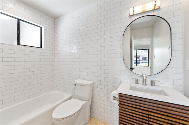 full bath with tile walls, toilet, and vanity