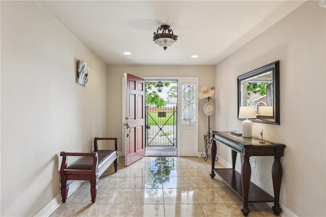922 Lamanche St, New Orleans, LA 70117 - foyer entrance featuring healthy amount of natural light, baseboards, recessed lighting, and light tile patterned floors