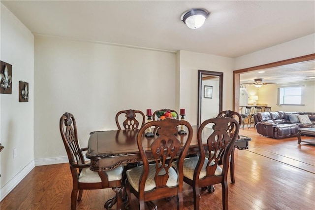 922 Lamanche St, New Orleans, LA 70117 - dining room with hardwood / wood-style floors and baseboards