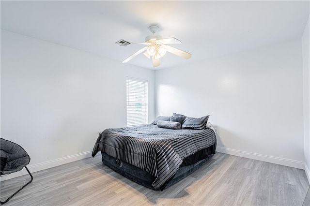 717 Magnolia Ave, La Place, LA 70068 - bedroom featuring wood finished floors, baseboards, and ceiling fan