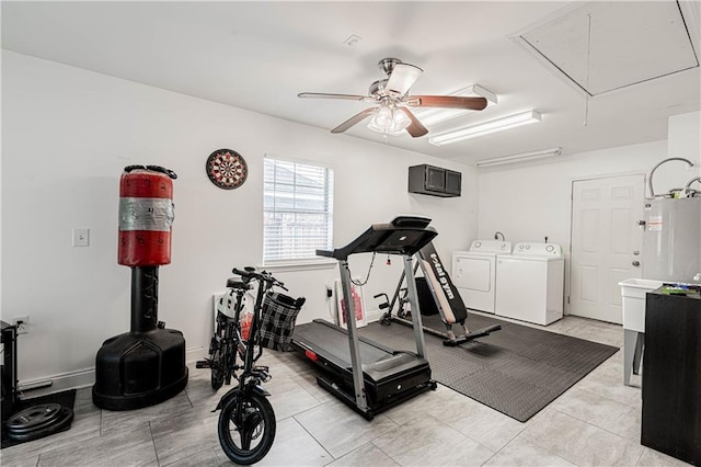 717 Magnolia Ave, La Place, LA 70068 - workout room with attic access, separate washer and dryer, water heater, and a ceiling fan