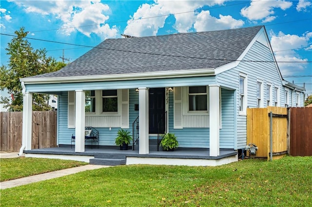 3827 Catherine Ave, Metairie, LA 70001 - bungalow-style house with covered porch and a shingled roof