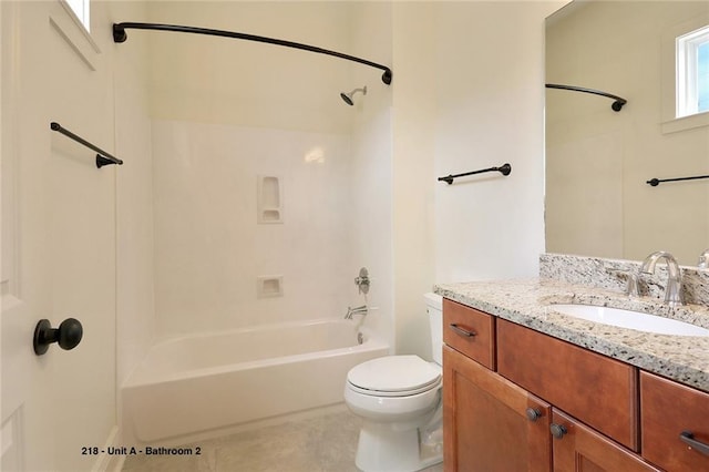 218 S Gayoso St, New Orleans, LA 70119 - bathroom with bathtub / shower combination, toilet, vanity, and tile patterned flooring
