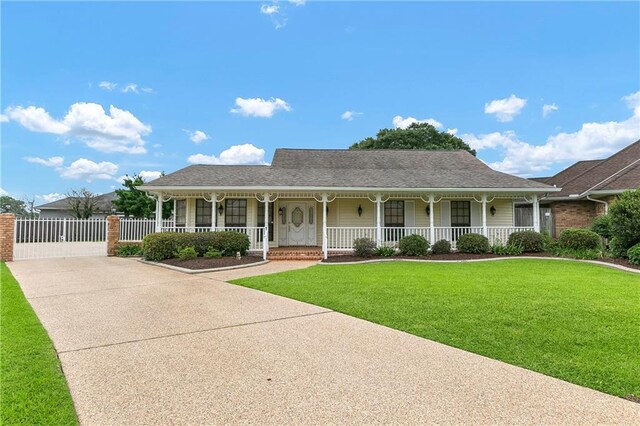 1 Fairfax Ct, Marrero, LA 70072 - view of front of home with a porch and concrete driveway