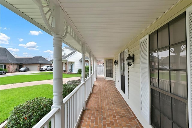 1 Fairfax Ct, Marrero, LA 70072 - porch featuring a lawn and a residential view