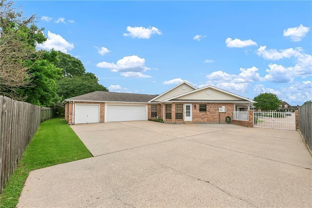 1 Fairfax Ct, Marrero, LA 70072 - view of front of home with brick siding, concrete driveway, and an attached garage