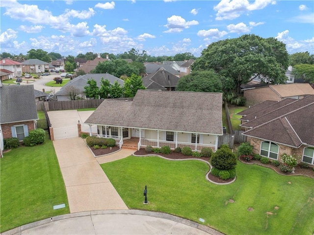 1 Fairfax Ct, Marrero, LA 70072 - view of front of property featuring covered porch, a residential view, and driveway