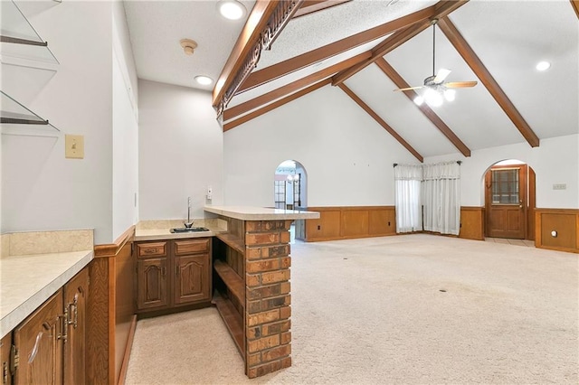 1 Fairfax Ct, Marrero, LA 70072 - bar area featuring wainscoting, beam ceiling, a sink, arched walkways, and ceiling fan