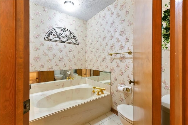 1 Fairfax Ct, Marrero, LA 70072 - bathroom with toilet, tile patterned floors, a textured ceiling, a bath, and baseboards