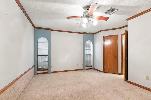 1 Fairfax Ct, Marrero, LA 70072 - empty room featuring crown molding, carpet floors, ceiling fan, a textured ceiling, and baseboards