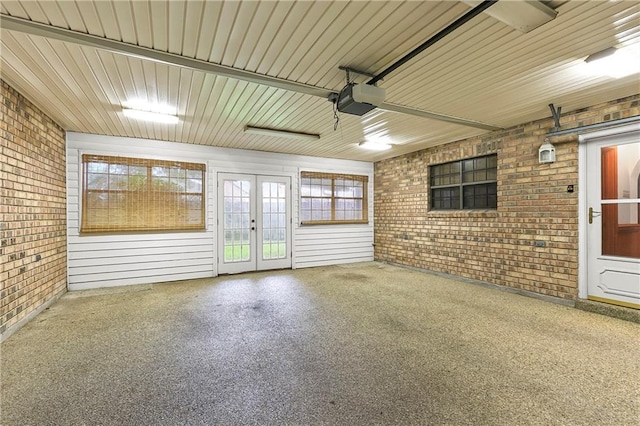 1 Fairfax Ct, Marrero, LA 70072 - garage with french doors and a garage door opener