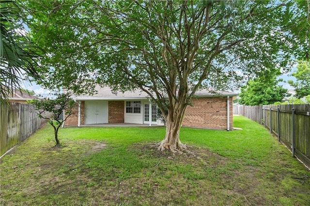 1 Fairfax Ct, Marrero, LA 70072 - back of house with brick siding, a patio, and french doors