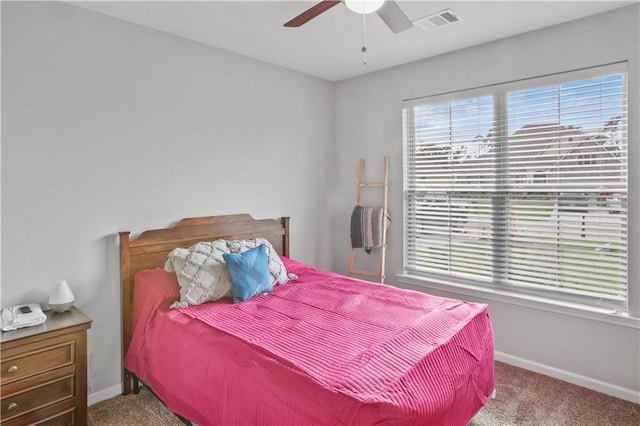 bedroom with carpet, baseboards, and ceiling fan