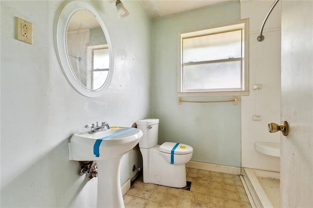 121 Saint Nicholas St, Luling, LA 70070 - bathroom with toilet, a shower, and a sink