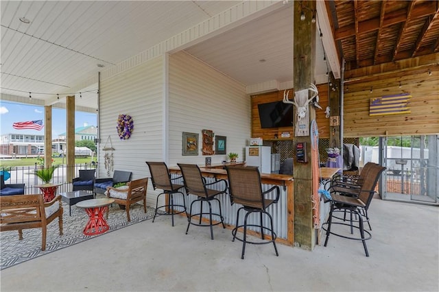 4102 Pennsylvania St, Bay Saint Louis, MS 39520 - view of patio / terrace with exterior bar and an outdoor hangout area