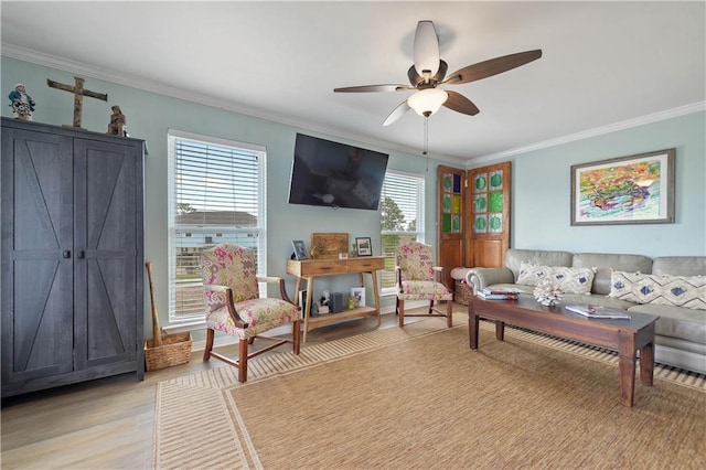 4102 Pennsylvania St, Bay Saint Louis, MS 39520 - living room with ornamental molding, ceiling fan, and light wood-style floors