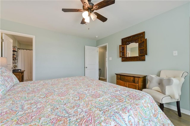 4102 Pennsylvania St, Bay Saint Louis, MS 39520 - bedroom featuring wood finished floors, baseboards, and ceiling fan