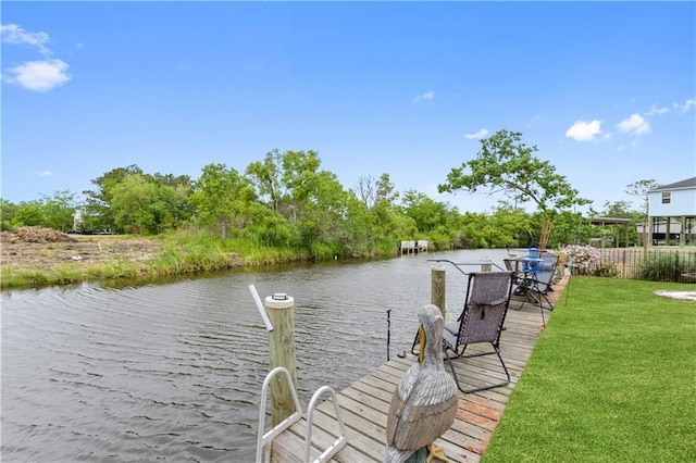 4102 Pennsylvania St, Bay Saint Louis, MS 39520 - dock area featuring a water view and a yard