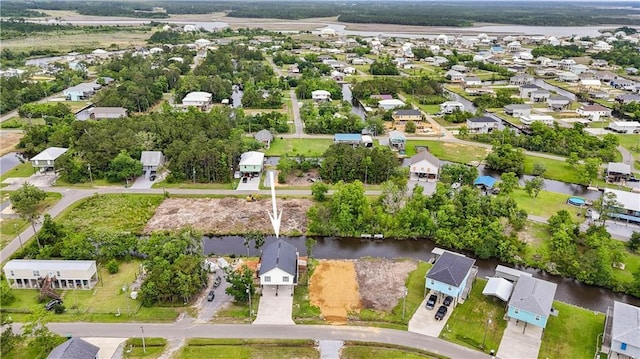 4102 Pennsylvania St, Bay Saint Louis, MS 39520 - aerial view of property and surrounding area featuring nearby suburban area and a nearby body of water