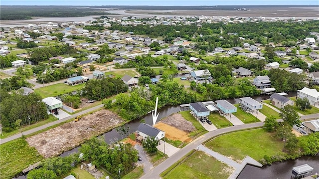 4102 Pennsylvania St, Bay Saint Louis, MS 39520 - aerial perspective of suburban area with a nearby body of water