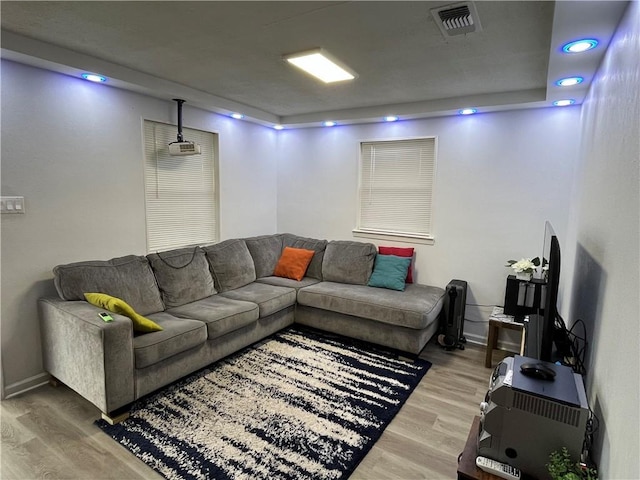 3278 Glen Eagle Ln, Kenner, LA 70065 - living area featuring wood finished floors, baseboards, and recessed lighting