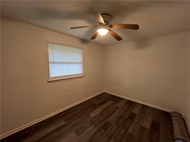 3278 Glen Eagle Ln, Kenner, LA 70065 - unfurnished room featuring dark wood-style flooring, baseboards, and a ceiling fan